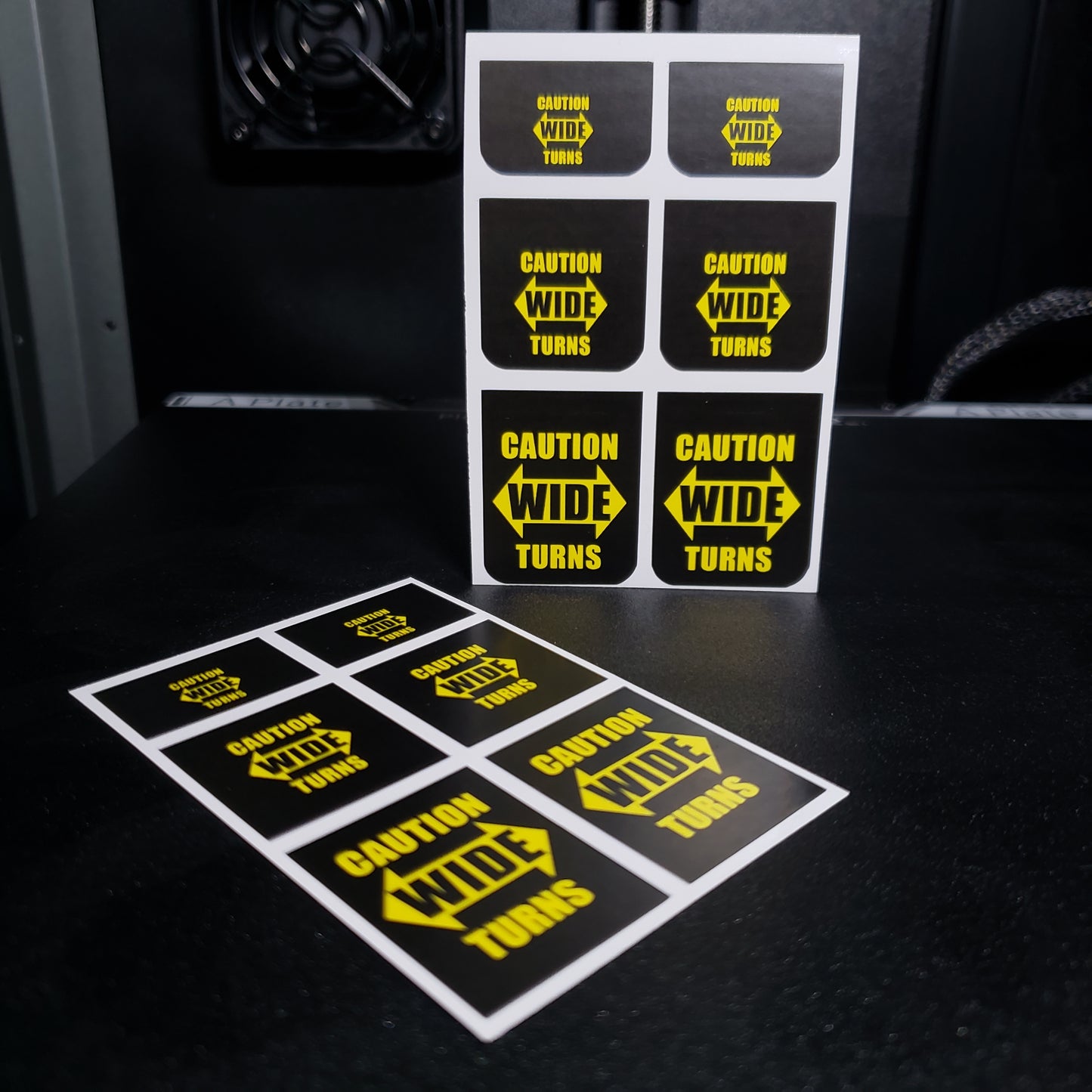 1/25 Caution Wide Turns on Black MudFlap
