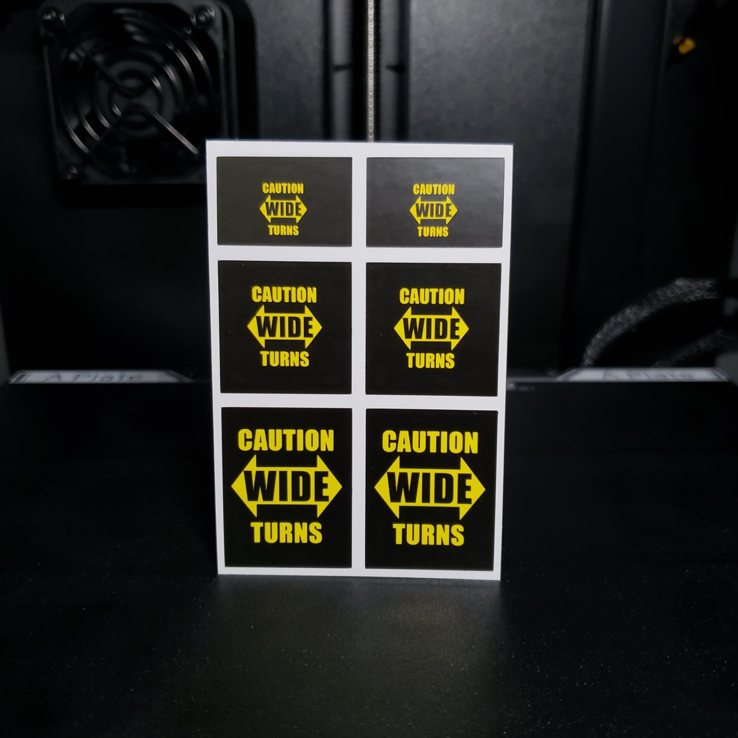 1/25 Caution Wide Turns on Black MudFlap